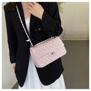 Pink quilted chain shoulder bag detail shot, stylish leather crossbody bag for women daily commute.