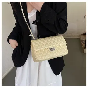 Quilted chain shoulder bag for women, classic cream crossbody purse with turn lock closure.
