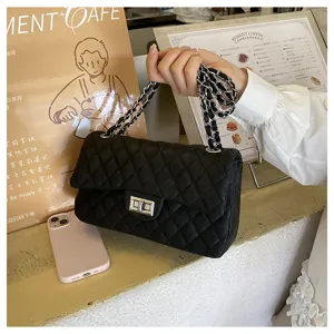 Classic quilted chain shoulder bag for women, stylish crossbody bag with flap and metal lock.