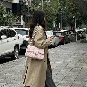 Pink quilted chain shoulder bag for women, elegant fashion crossbody handbag daily use.