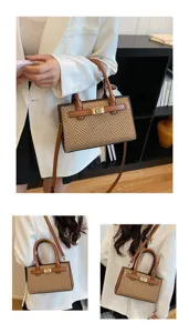 Tweed textured women crossbody shoulder bag with top handle and chic turn lock closure.
