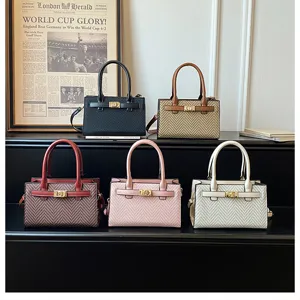 Detailed view of stylish multi-color top-handle shoulder bags showcasing fine texture for daily wear.