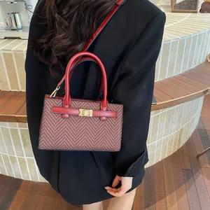 Fashion contrast color handbag women's elegant shoulder messenger bag with metal lock.