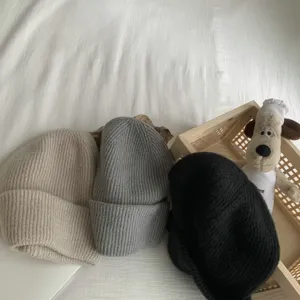Femme hiver couleur unie bonnet en tricot chapeau pour un loisir chaud doux en laine
