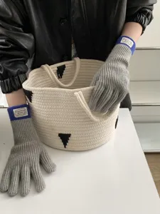 Cozy color-block knit touchscreen gloves for women, perfect for autumn and winter warmth.