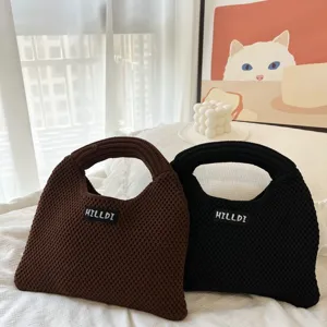 Minimalistische Strick Handtasche für Damen, lässige Tragetasche mit weicher Textur.
