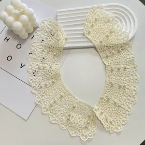 Chic white lace detachable fake collar with delicate pearls, perfect for summer dress styling.