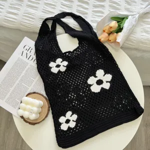 Casual black knit floral tote bag, vintage hollow shoulder shopping bag for daily use.