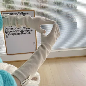 Gemütliche lange Strick-Fingerlose Handschuhe für Damen, warme einfarbige Armwärmer.