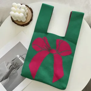 Sac cabas en tricot vert avec nœud rose, sac à main chic et tendance pour femmes et filles.