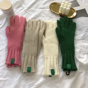 Cozy winter knit gloves in multiple colors, featuring ribbed cuffs and soft warm fabric for daily wear.