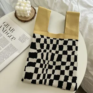 Knitted checkerboard tote bag in yellow and black, stylish casual handbag for women.