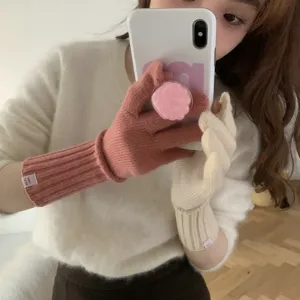 Solid color knit fingerless touch screen gloves, a warm winter fashion clothing accessory.