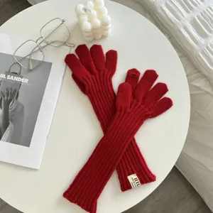 Cozy winter knit long fingerless gloves for women, solid color warm arm warmers for cold days.