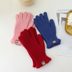 Winter knit touchscreen gloves with cute ruffles, cozy warm split finger design for women.