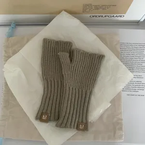 Cozy knit fingerless gloves for women, thick warm solid color winter wrist warmers.
