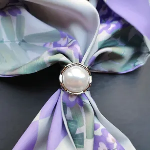 Pearl silk scarf ring detail close up view, elegant silver metal buckle for women accessories