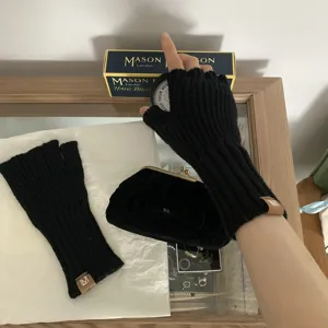 Black knit fingerless gloves for women, warm winter ribbed wrist warmers, solid color.