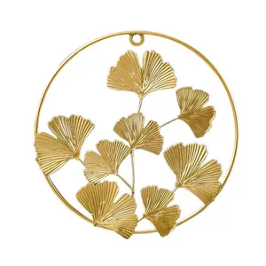 Decorazione da parete in metallo con foglie di ginkgo dorate nordiche, design rotondo elegante.