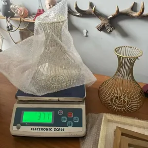 Metal wire wine cork storage basket decorative container for bar and home kitchen use.