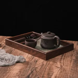 Retro wooden rectangular tea tray with glass insert, vintage tea set holder for home use.