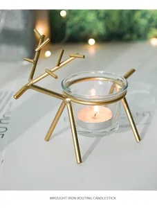 Nordic minimalist wrought iron deer candle holder with glass cup for romantic table decor.