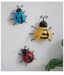 Creative metal insect wall hanging, cute ladybug and bee decor for garden and home wall.
