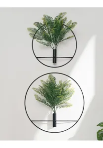 Modern minimalist iron art wall hanging vase with artificial green plants for home indoor decor.