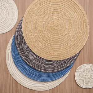 Round braided placemats and coasters set for dining table heat insulation and kitchen use.