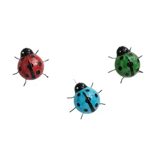 Metal ladybug wall art decor set, colorful outdoor garden ornaments for lawn and yard.