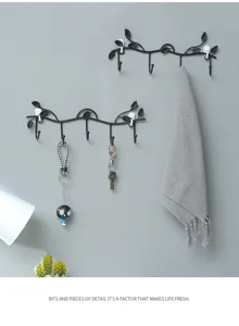 Nordic black iron leaf wall hook punch-free coat rack for entryway, door key and towel storage.