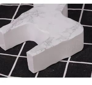 Nordic style marble texture horse ornament detail view, modern home desktop decor showcase.