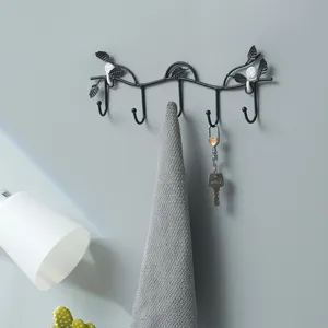 Nordic style black iron wall coat hook with leaf design, punch-free entryway key and towel rack.