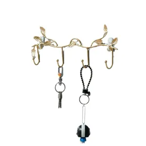Nordic style metal leaf wall hook punch-free coat rack entryway key storage organizer.