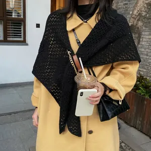 Black knit triangle scarf shawl with chic chain and leather buckle for winter warmth.