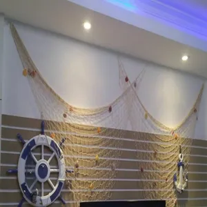Mediterranean decorative fishing net wall hanging prop with shells and rope details.