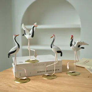 Elegant crane ornaments set featuring exquisite details, perfect for home and garden decor.