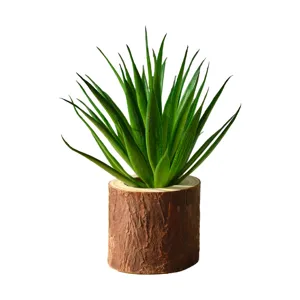 Artificial succulent plant in wooden bark pot for home decor and tabletop display.
