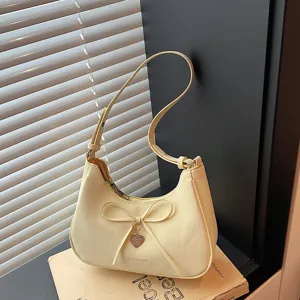 Sac à épaule jaune chic pour femme avec nœud mignon et pendentif cœur, style hobo.