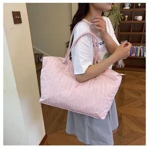 Large capacity pink quilted shoulder bag, lightweight casual travel tote for women daily use.