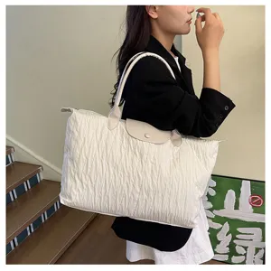 Stylish pleated tote bag for women, large capacity shoulder bag for commuting, travel, and yoga.