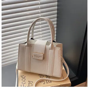 Sac a main cabas fourre tout en cuir PU blanc avec anses et bandouliere pour femme usage.