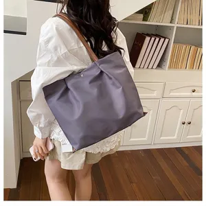Casual nylon shoulder bag for women, large capacity tote bag with brown straps for daily commute.