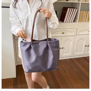 Casual purple nylon tote bag with brown handles, large capacity daily commuter shoulder bag for women.