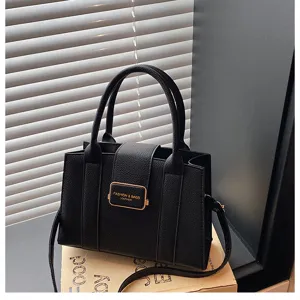 Sac a main cabas en cuir PU noir avec anses et bandouliere pour femme sac shopping mode.