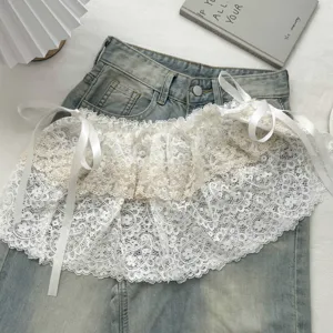 Detail shot of the exquisite double-layer lace skirt extender with cute white ribbon ties.
