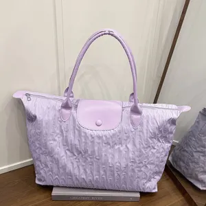 Large capacity purple travel shoulder bag, casual lightweight daily commuter tote bag.