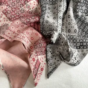 Retro botanical triangle scarf detail, vintage print cotton neck wrap, stylish layered shawl.