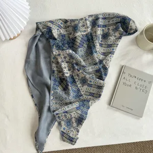 Retro ethnic botanical triangle scarf for women and men, stylish blue cotton shawl daily wear.