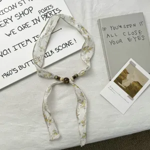 Floral pattern fabric ribbon scarf with wooden beads stylish neck accessory for women.